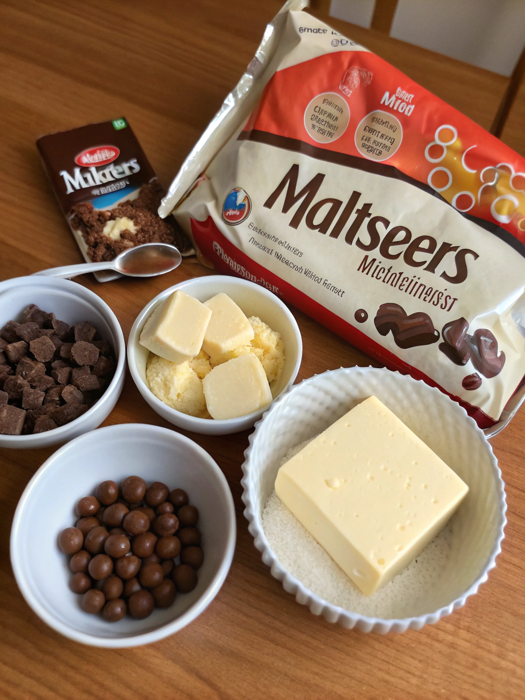 Malteser shortbread ingredients on wooden table